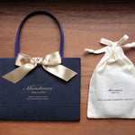 こちらは<a style="text-decoration: underline; font-weight: bold;" href="https://munekawa-jp.pro/products/coa2">レザーコースター</a>のラッピングです。<br>※アイテムごとのラッピング仕様は、各商品ページをご確認ください。