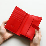 ストラップ付縦長二つ折り財布“Fasten”